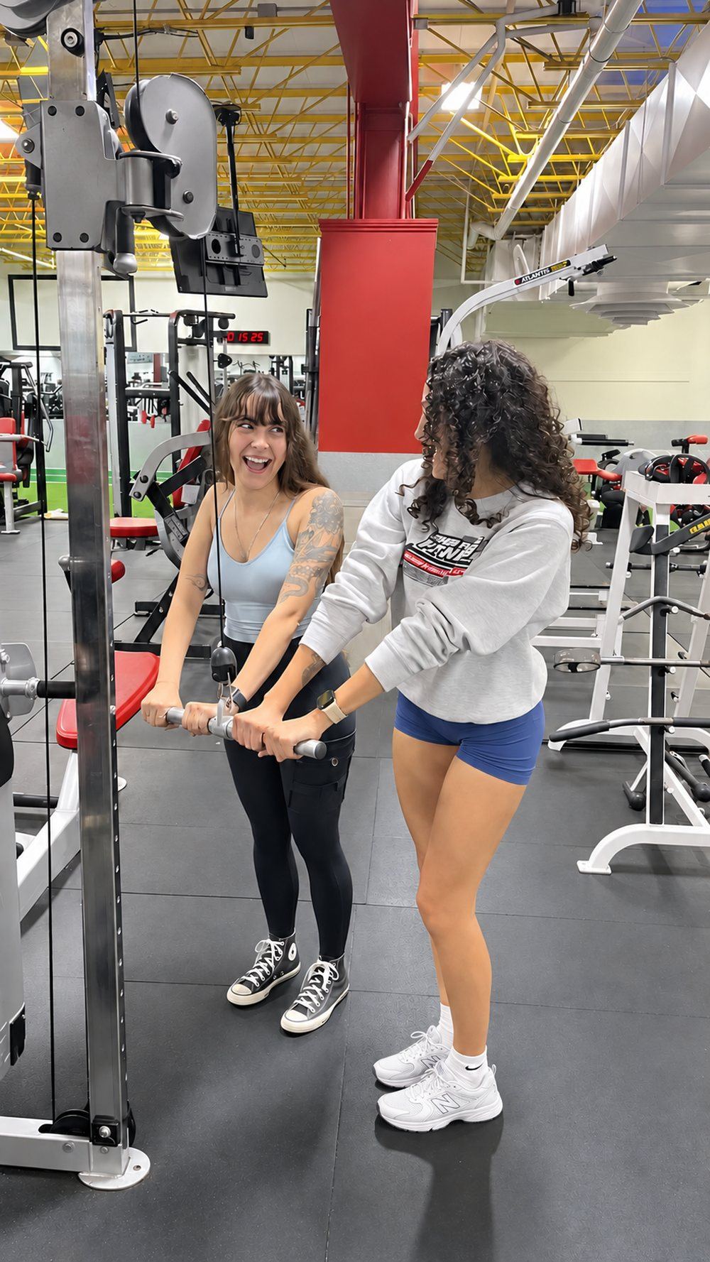 Two friends laughing while training together at SFF