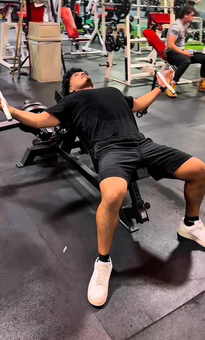 Member training on the Arsenal Strength Reloaded Incline Fly