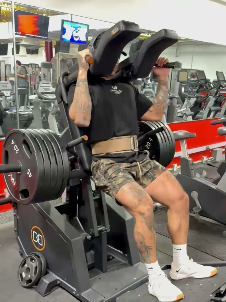 Max on the Booty Builder V-Squat, loaded with plates
